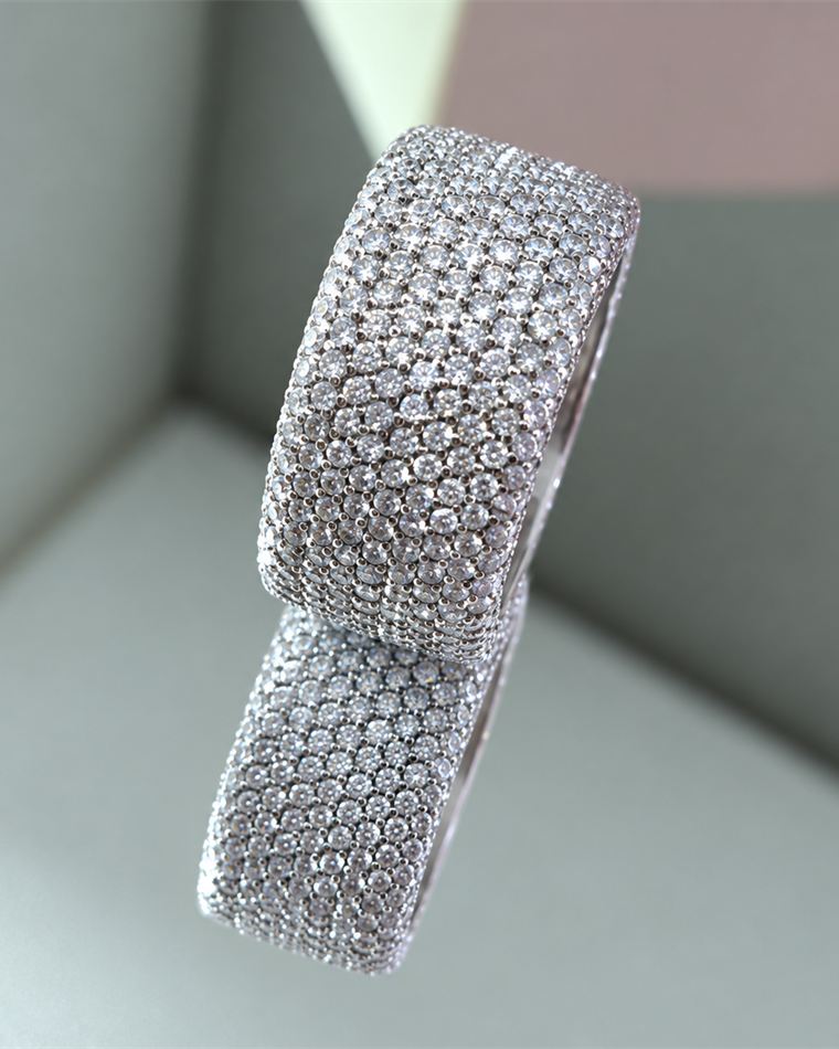 Wide white gold band fully set with pave diamonds